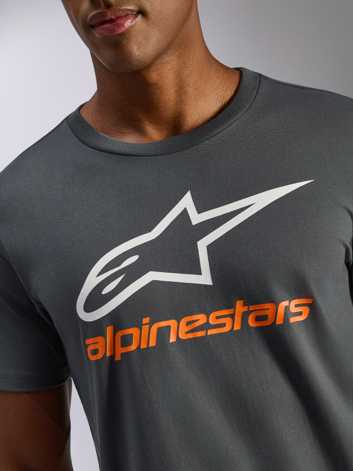 Alpinestars Always 2.0 CSF Tee, Short Sleeve T-Shirt, Charcoal Gray, White A-star logo and orange Alpinestars lettering, casual motorsport streetwear