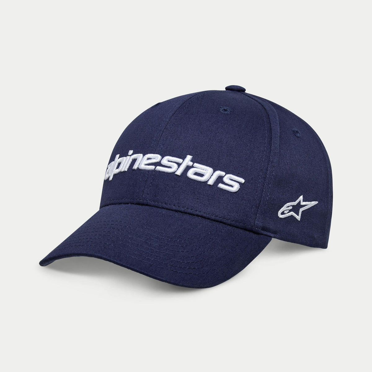 Casquette Alpinestars Linear Wordmark 2.0, bleu marine avec broderie blanche, casquette snapback à visière courbée avec logo linéaire Alpinestars en 3D et logo étoile Ageless sur le côté, sportswear décontracté