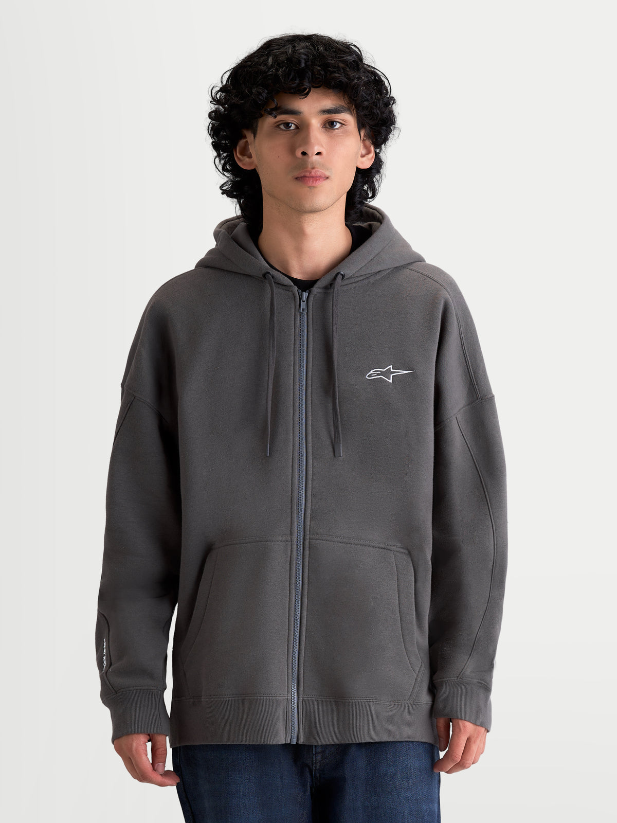 Alpinestars Sweat à capuche Entity Oversized, sweat à capuche zippé sportswear pour homme, gris anthracite, coupe décontractée en polaire avec logo Astars brodé, zip Vislon et poche kangourou.