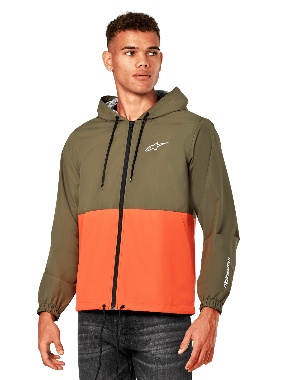 Veste coupe-vent Alpinestars Speeder, coupe-vent léger à capuche, orange militaire et vert olive, design à blocs de couleurs avec logo blanc sur la poitrine et la manche, vêtement d'extérieur décontracté inspiré du sport automobile