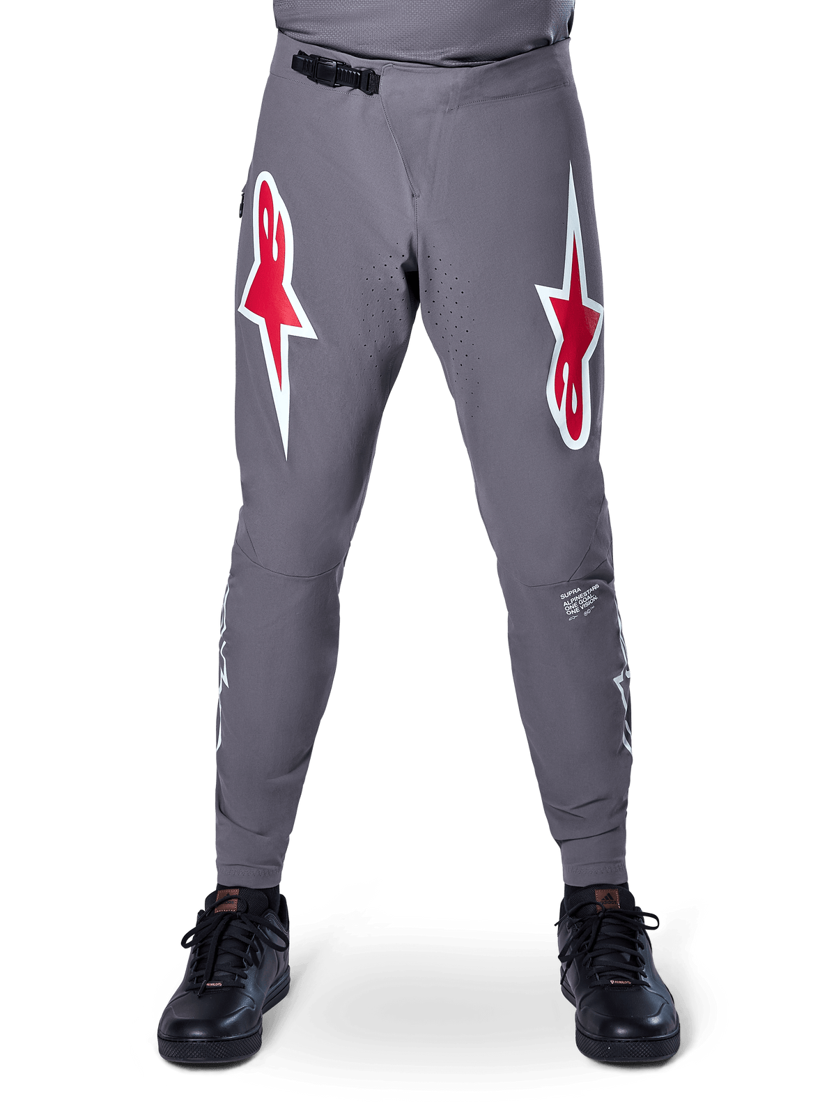 Alpinestars A-Supra Race Pants, MTB Racing Pants, Dark Gray, featuring large red and white star logos on the thighs, laser-perforated ventilation on inner legs, and a black ratchet waist closure, designed for mountain bike racing.