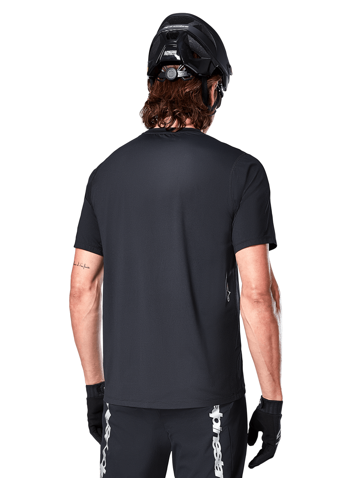 Alpinestars A-Dura Switch, maillot de VTT noir pour homme, manches courtes, vue de dos, ourlet allongé et coupe standard.