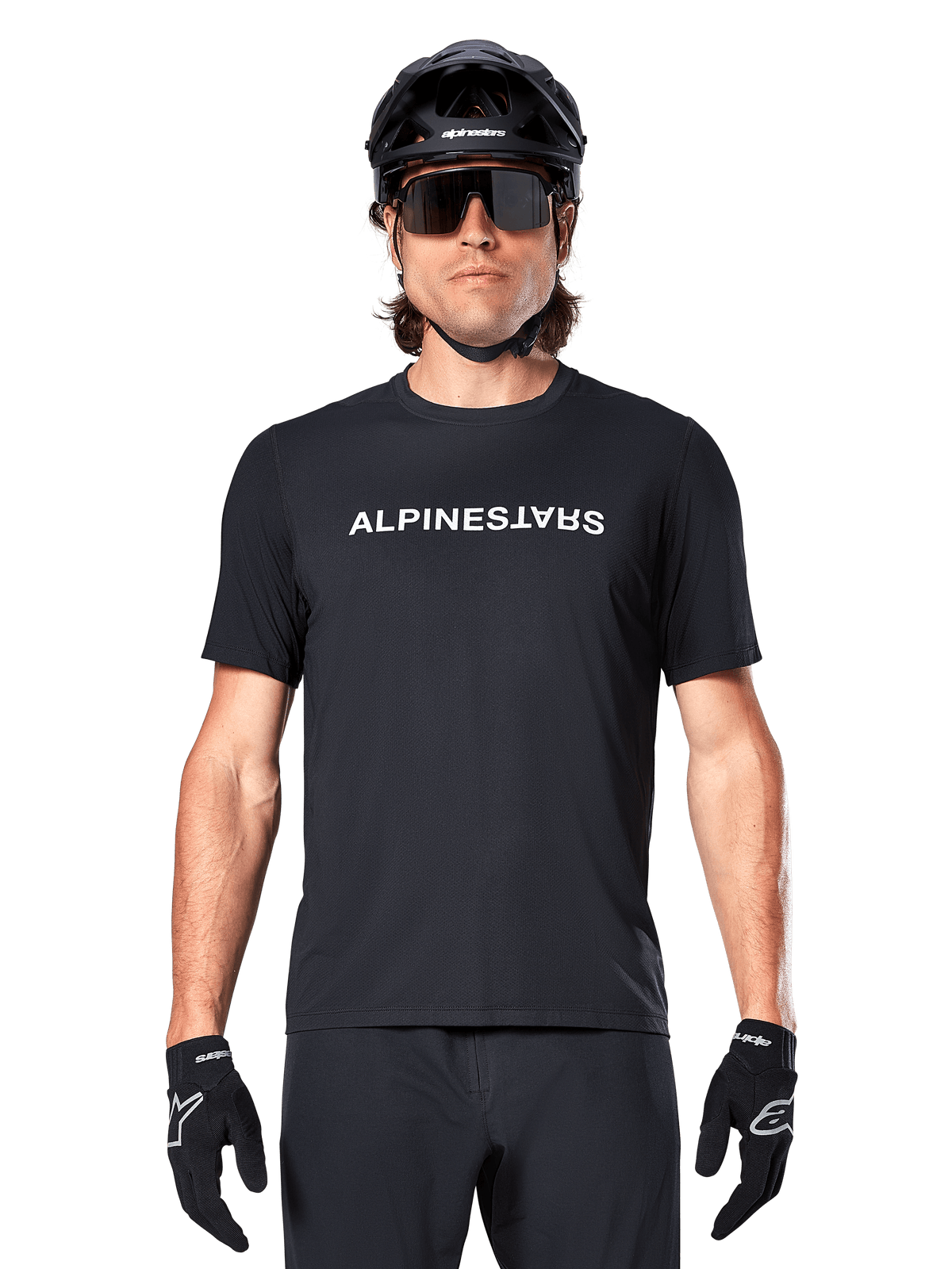 Alpinestars A-Dura Switch, maillot de VTT à manches courtes, homme, noir et blanc, respirant, porté par un cycliste.