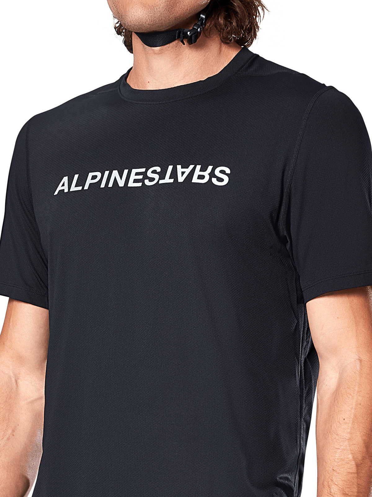 Maillot Alpinestars A-Dura Switch, maillot de VTT à manches courtes, noir avec logo blanc sur la poitrine, tissu jacquard