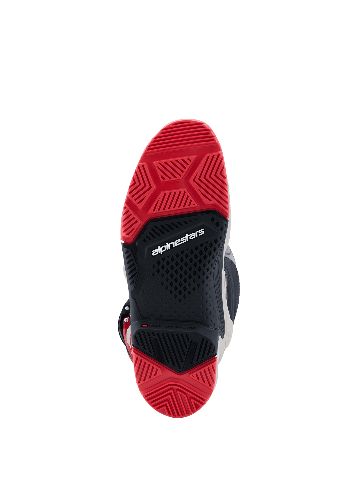 Bottes Alpinestars Tech 7 Enduro 2026, vue de dessous de la semelle à double composé, caoutchouc rouge vif et noir avec un motif de crampons spécialisé pour l'adhérence tout-terrain, logo Alpinestars blanc au centre.