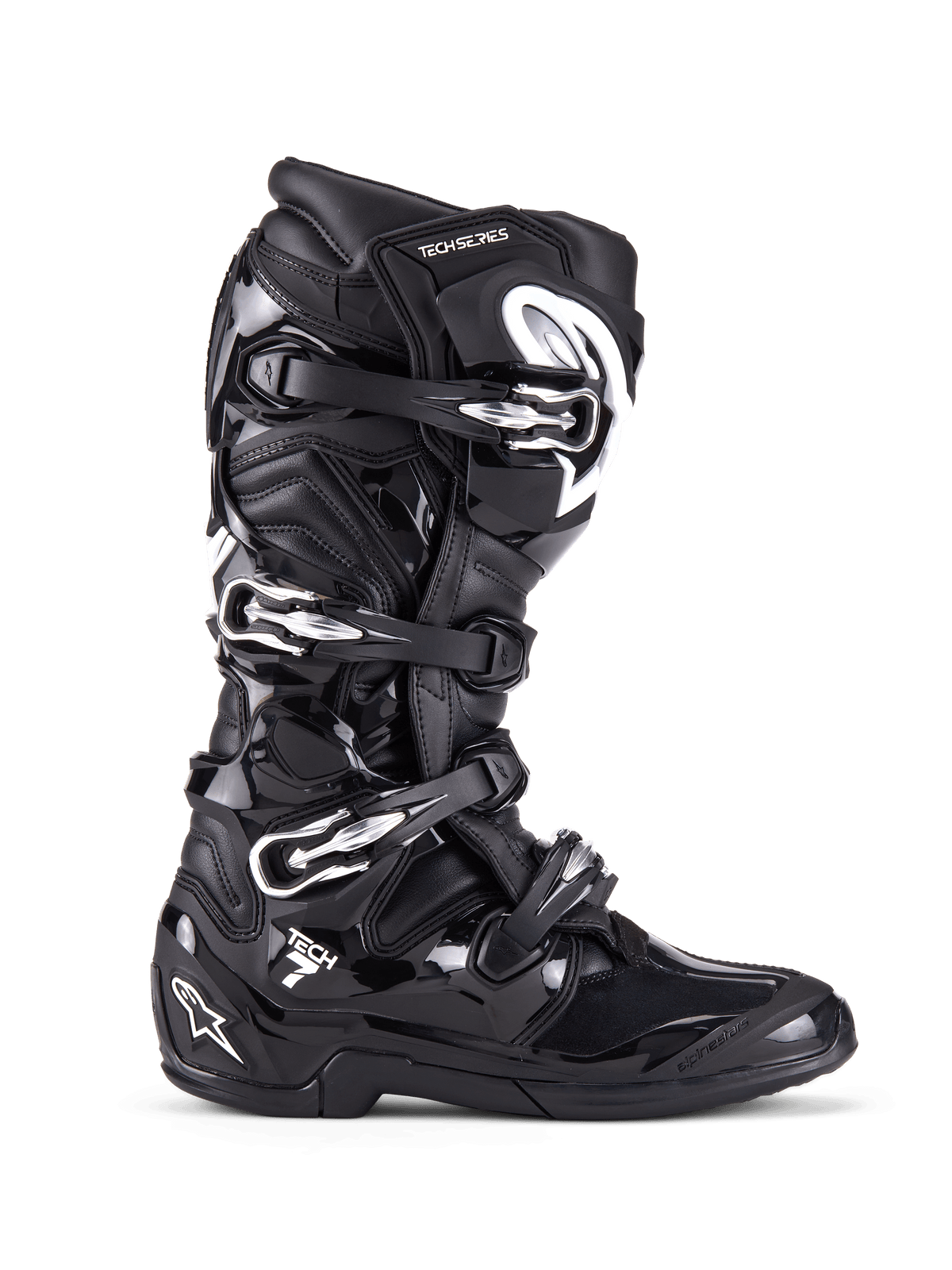 Alpinestars Tech 7 laarzen, motorcross off-road laarzen, zwart met zilveren gespen en witte accenten, zijaanzicht met vier aluminium snelsluitingen, duurzame TPU-schaal en getextureerde panelen voor off-road bescherming