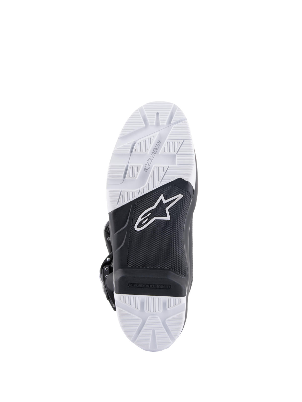 Alpinestars Tech 7 Enduro laarzen, onderaanzicht van de zool met de speciaal ontwikkelde samengestelde buitenzool, zwart-wit tweekleurig ontwerp met getextureerde grippatronen, wit ster-logo en een vervangbare voetsteun-insert.