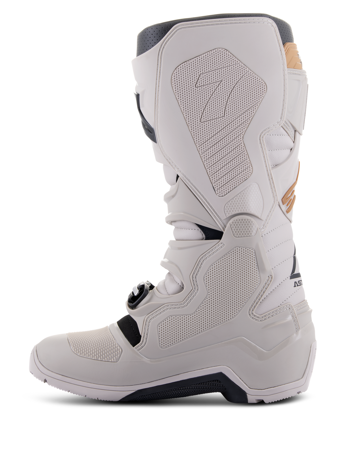 Bottes Alpinestars Tech 7 Enduro Drystar® en Gris Sable, vue du côté médial montrant des panneaux d'adhérence à texture nid d'abeille, construction en TPU gris clair et microfibre, semelle extérieure noire et membrane imperméable pour des performances tout-terrain.