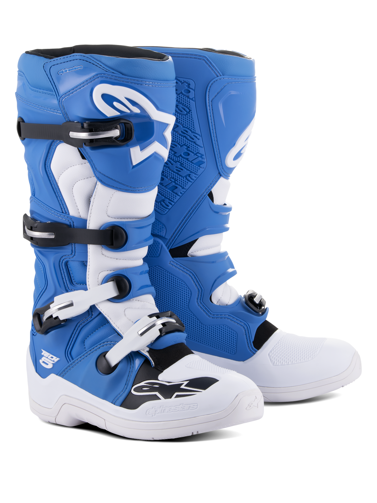 Alpinestars Tech 5 Stiefel, Motocross- und Offroad-Stiefel, Blau und Weiß, Mehrmaterial-Konstruktion mit vier schwarz-weißen Schnallen, weiße Schienbeinplatte mit großem Astars-Logo und strapazierfähige weiße Sohle.
