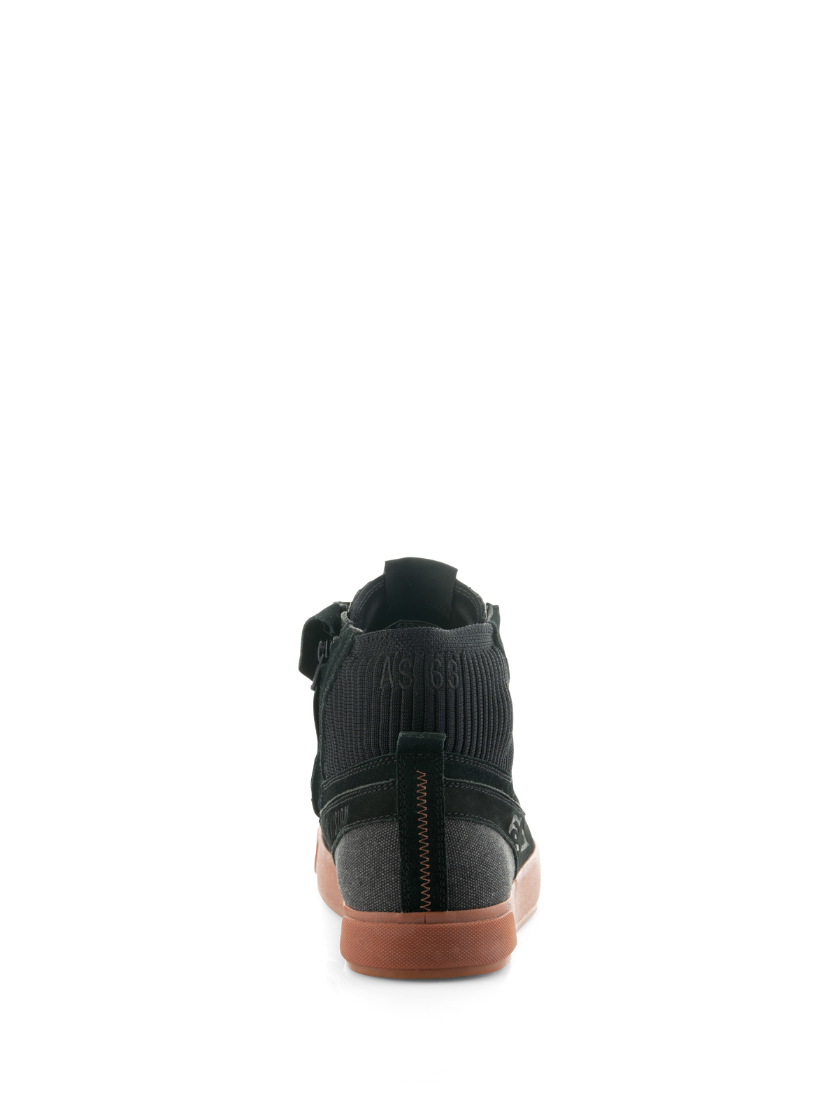 Chaussures Alpinestars Stated, chaussures de conduite urbaine Black Gum, vue arrière montrant la semelle vulcanisée couleur gomme, tige en daim et toile noirs, et col de cheville en tricot côtelé