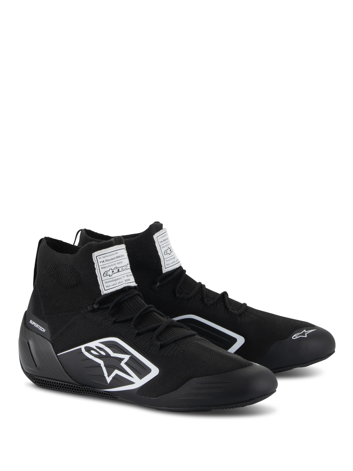 Alpinestars Supertech Shoes, Auto Racing Shoes, Black, featuring a fully knitted fire-retardant upper and carbon fiber heel cup, white Alpinestars logo on the side, FIA/SFI certification labels on the tongue, professional motorsport footwear with a sleek design
