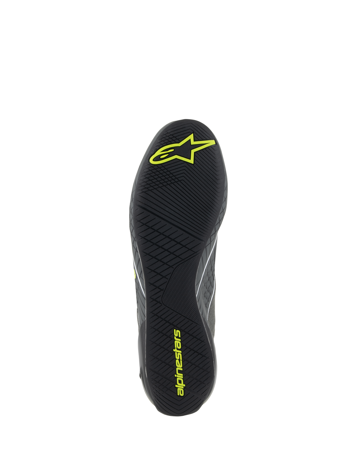 Chaussures Alpinestars Supertech, chaussures de course automobile, gris et jaune fluo, vue détaillée de la semelle extérieure en caoutchouc noir avec bande de roulement asymétrique texturée et logos Alpinestars jaunes pour l'adhérence aux pédales et la sensibilité.