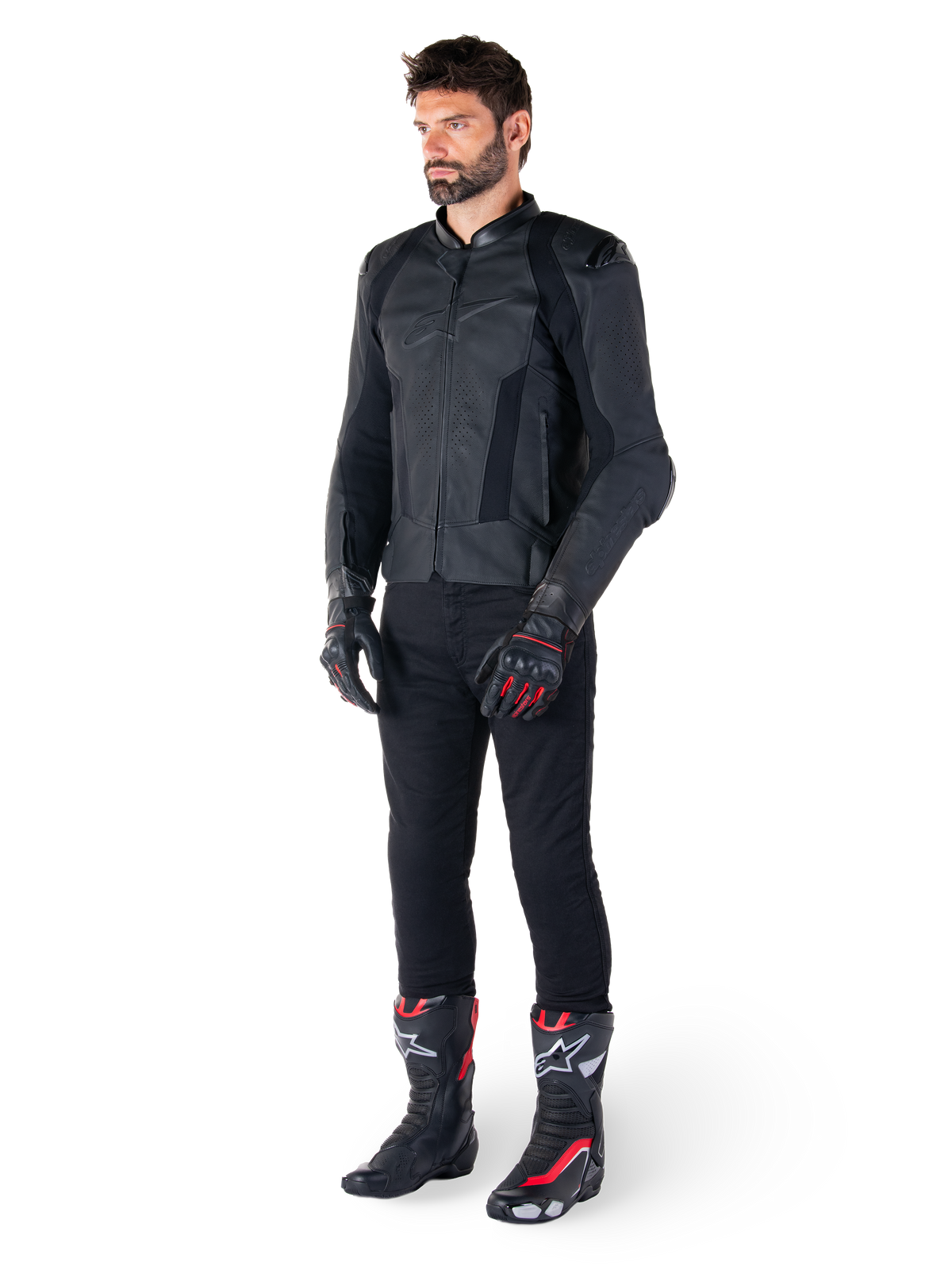 Alpinestars Missile V3 Leather Jacket, Black, worn by a rider with black pants and black and red racing gloves and boots, featuring perforated leather panels and sleek monochromatic branding, professional racing sport aesthetic