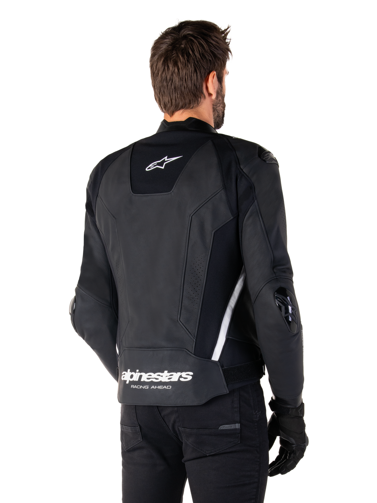 Alpinestars Missile V3 Leren Jas, achteraanzicht, zwart en wit, met het Alpinestars ster-logo op de bovenrug en woordmerk op de onderrug, beschermende sliders op ellebogen en schouders, premium lederen race-uitrusting