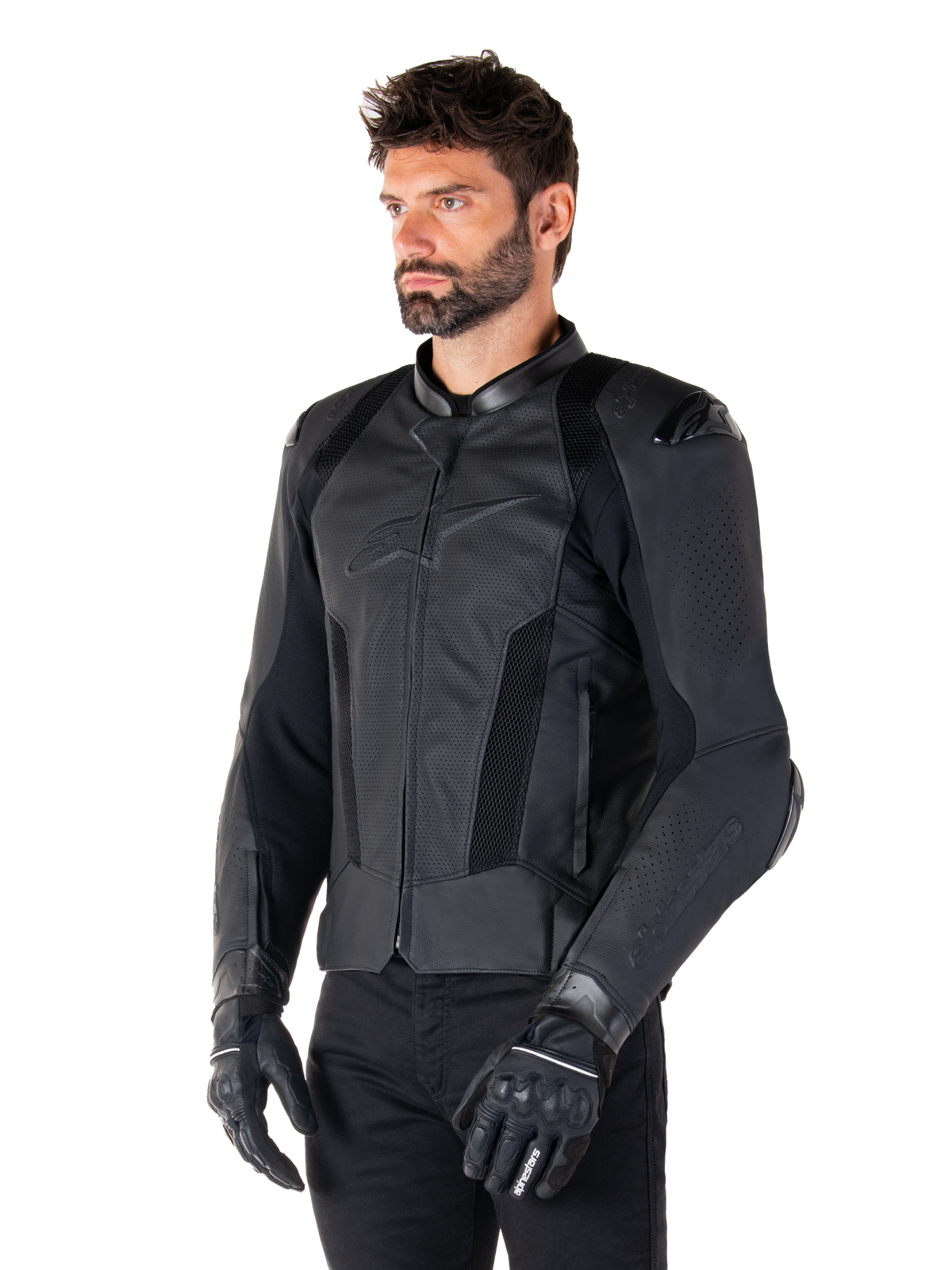 Alpinestars Missile V3 Airflow Leren Jas, Black Black, gedragen door een man met zwarte motorhandschoenen en broek, voorzien van uitgebreide geperforeerde lederen panelen, DFS-schouderprotectoren en een stroomlijnd race-fit ontwerp