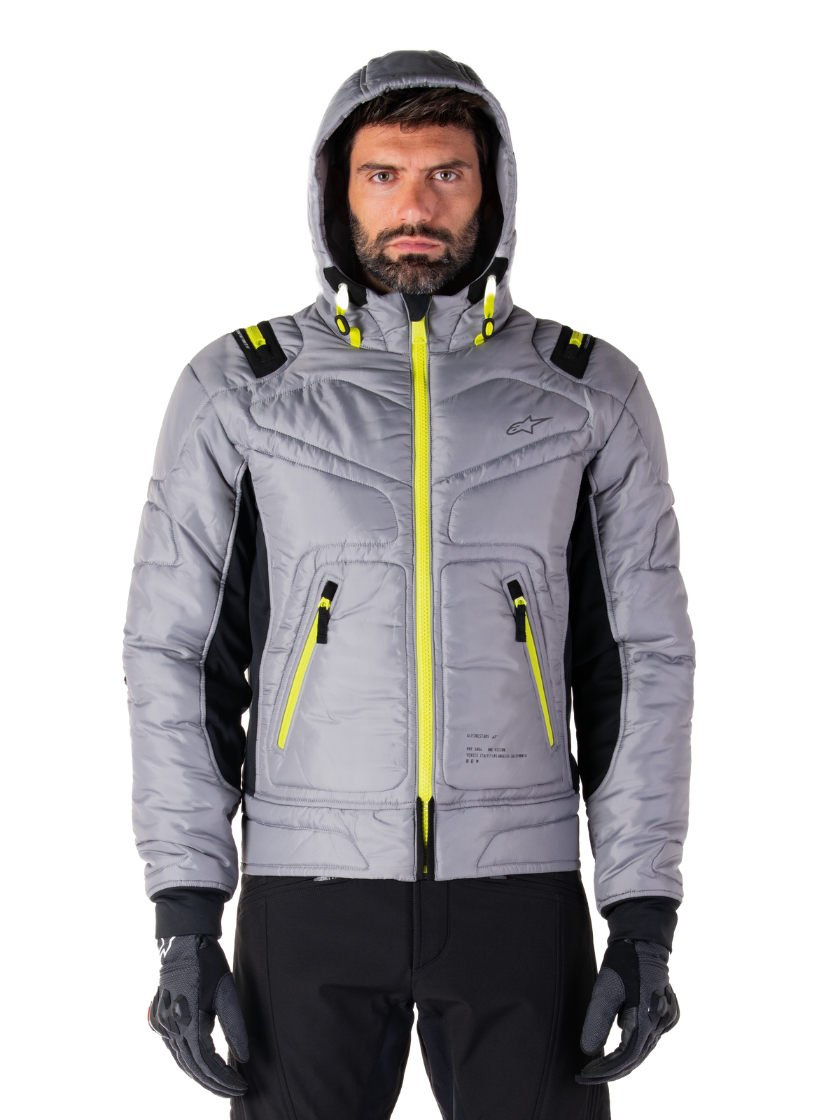 Alpinestars Mohobbs Waterproof jas, motor bomberjack, Lunar Gray en Lime Punch, gewatteerd ontwerp met felle neongele ritsen en accenten op de capuchon, moderne urban moto streetwear.
