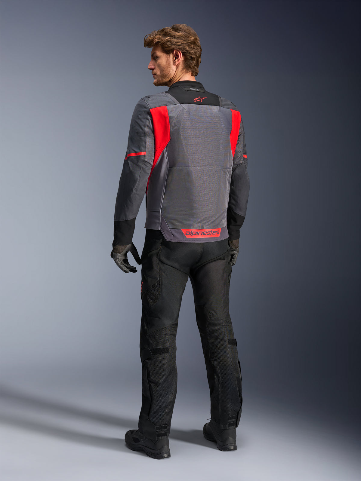 Alpinestars ST-2 Air herenmotorjas in grijs en rood met mesh rugpaneel voor geventileerde zomerse adventure touring