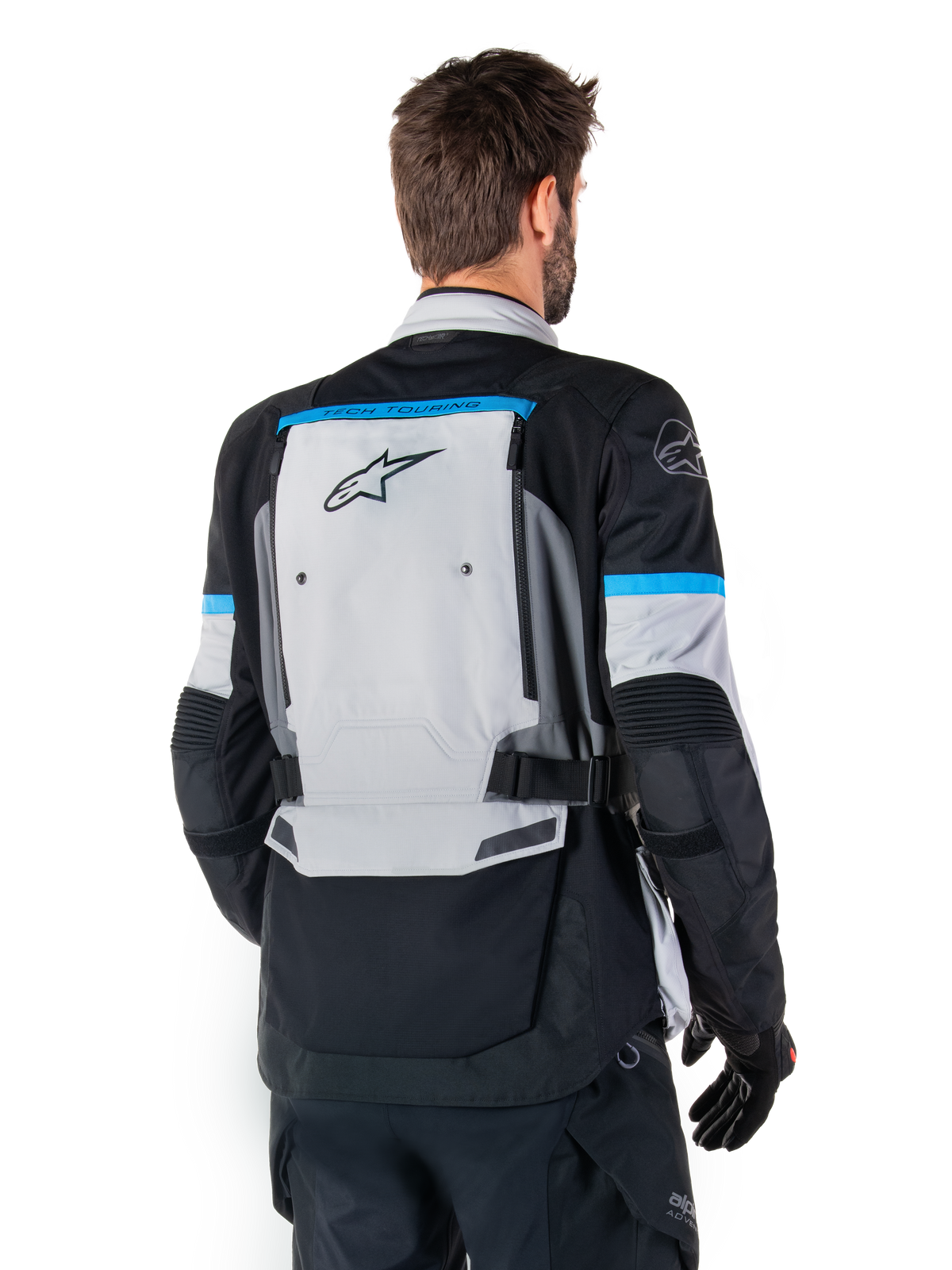 Alpinestars Bogota' Pro Drystar® Jacke, Adventure-Motorradjacke für Herren in Eisgrau, Schwarz und Cyan, Rückansicht.