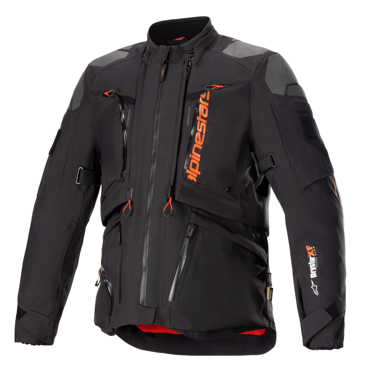Alpinestars AMT-10R Drystar XF motorjas, zwart en oranje, adventure touring motorjas, grijze schouderpatches, meerdere ritsen met oranje trekkers, verstelbare banden, rode binnenvoering, technische beschermende kleding