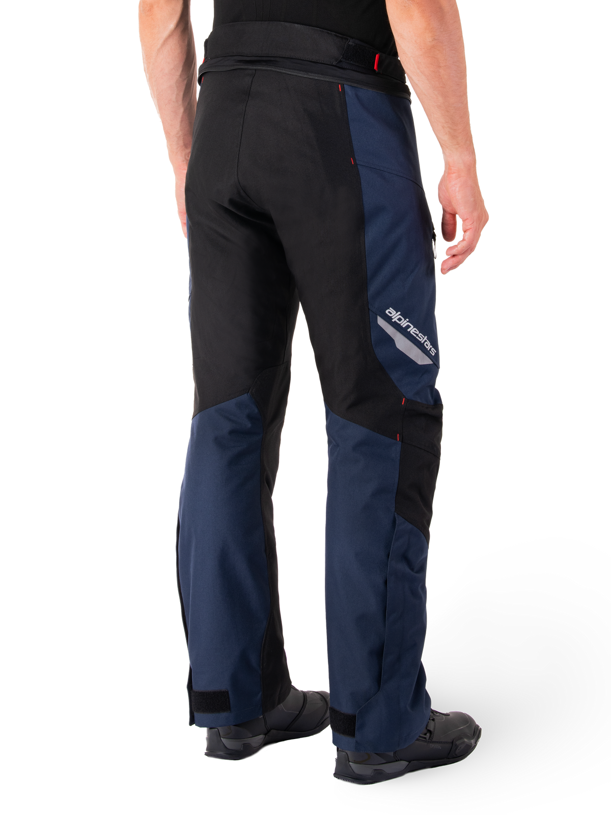 Alpinestars St-1 Waterproof Pants, Dark Blue Black and Bright Red, rear view showing black contrast panels, reflective Alpinestars logo on the side thigh, and ergonomic fit for motorcycle touring