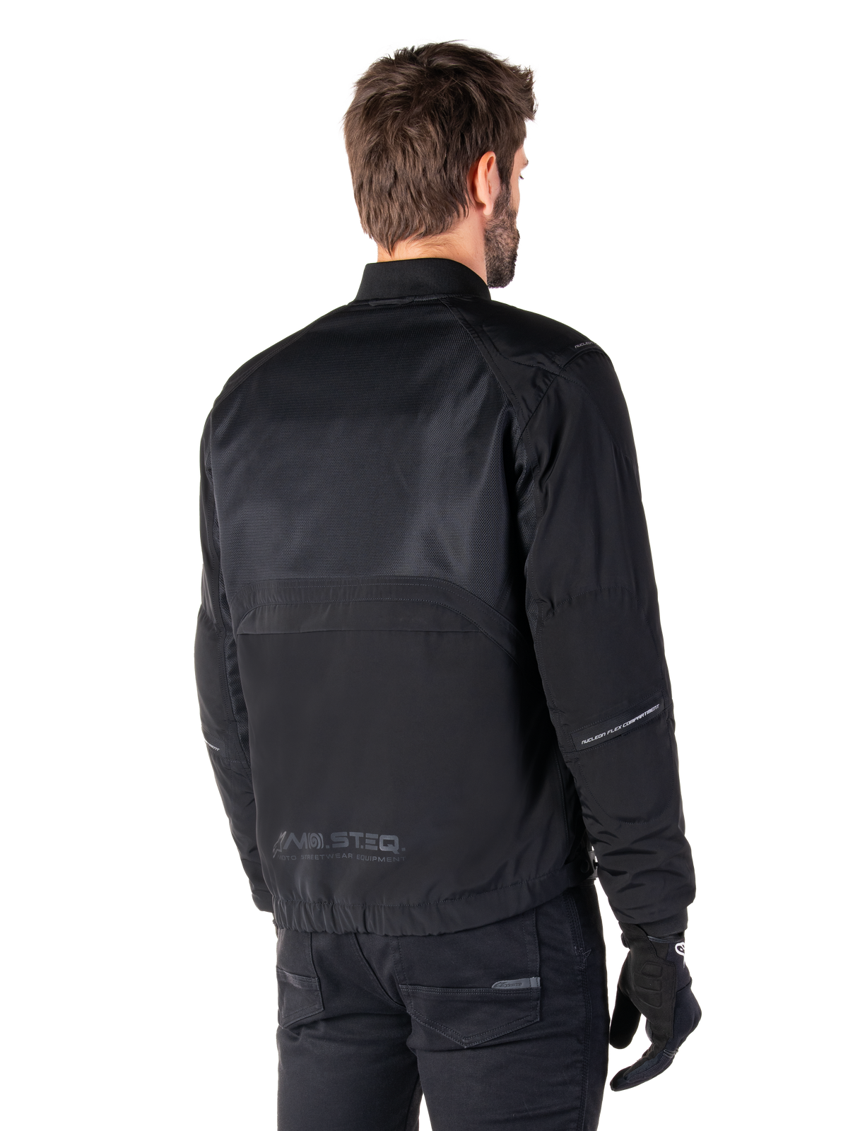 Alpinestars Mootant Waterproof Parka, schwarze Motorradjacke, Rückansicht, mit Mesh-Einsätzen im oberen Bereich und MO.ST.EQ. Moto Streetwear Equipment Branding, zeitgemäßes urbanes Design für den Straßeneinsatz