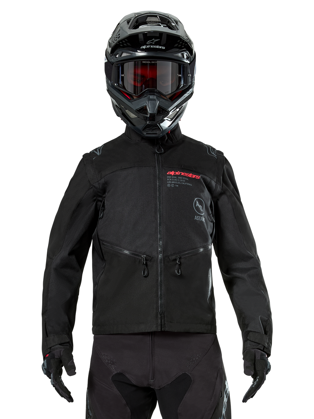 Veste Alpinestars Pro-Dura, veste de moto tout-terrain noire, vue de face portée par un pilote avec un casque et des lunettes noirs assortis, logo Alpinestars rouge, poches de poitrine zippées et construction textile durable pour l'enduro.