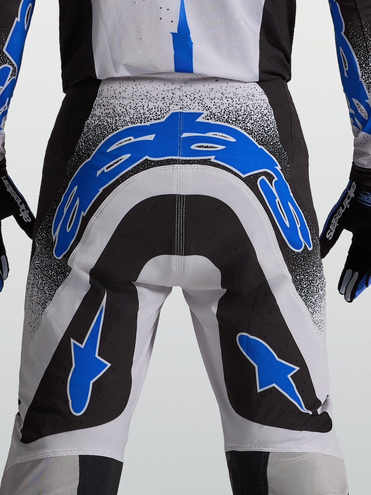 Alpinestars Supertech Hiten AFD broek, heren motorcrossbroek in blauw en zwart met atletische pasvorm en stretchpanelen.