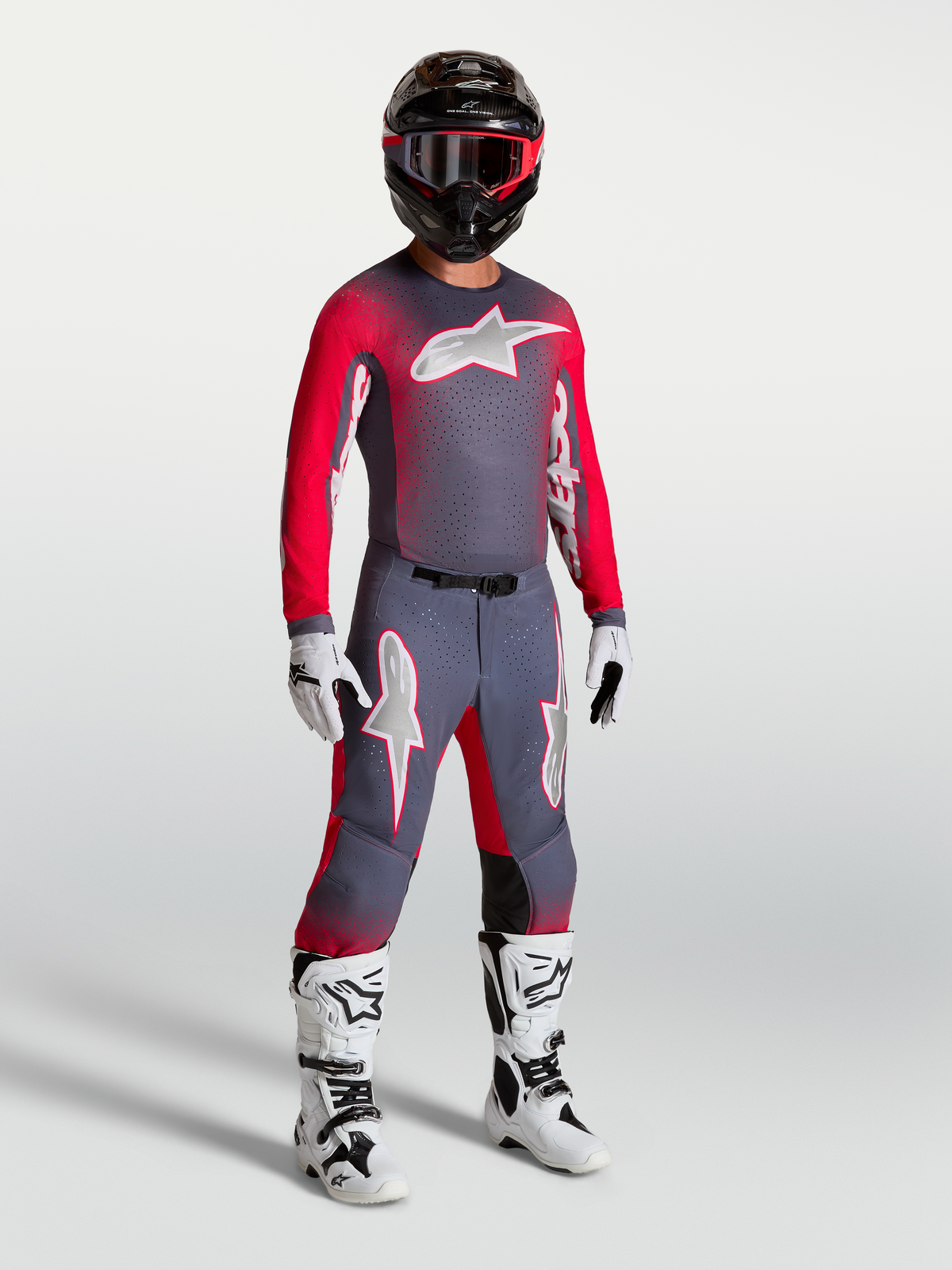 Alpinestars Supertech Hiten AFD broek en gearset, heren motorcross-uitrusting, grijs en fluo rood, atletische pasvorm.