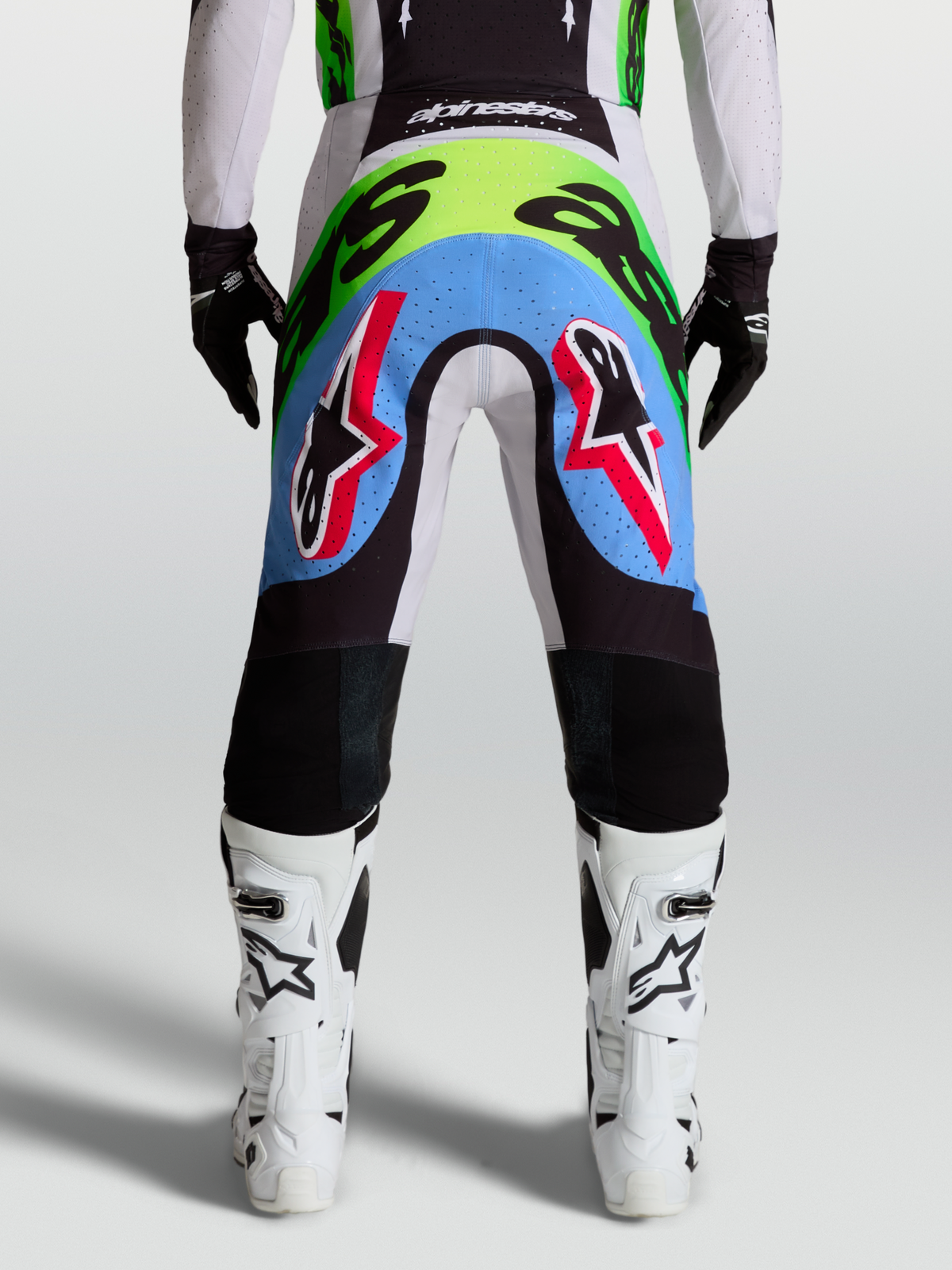 Alpinestars pantalon Supertech Dyna, motocross pour homme, vert fluo et lilas clair, vue arrière, panneaux perforés