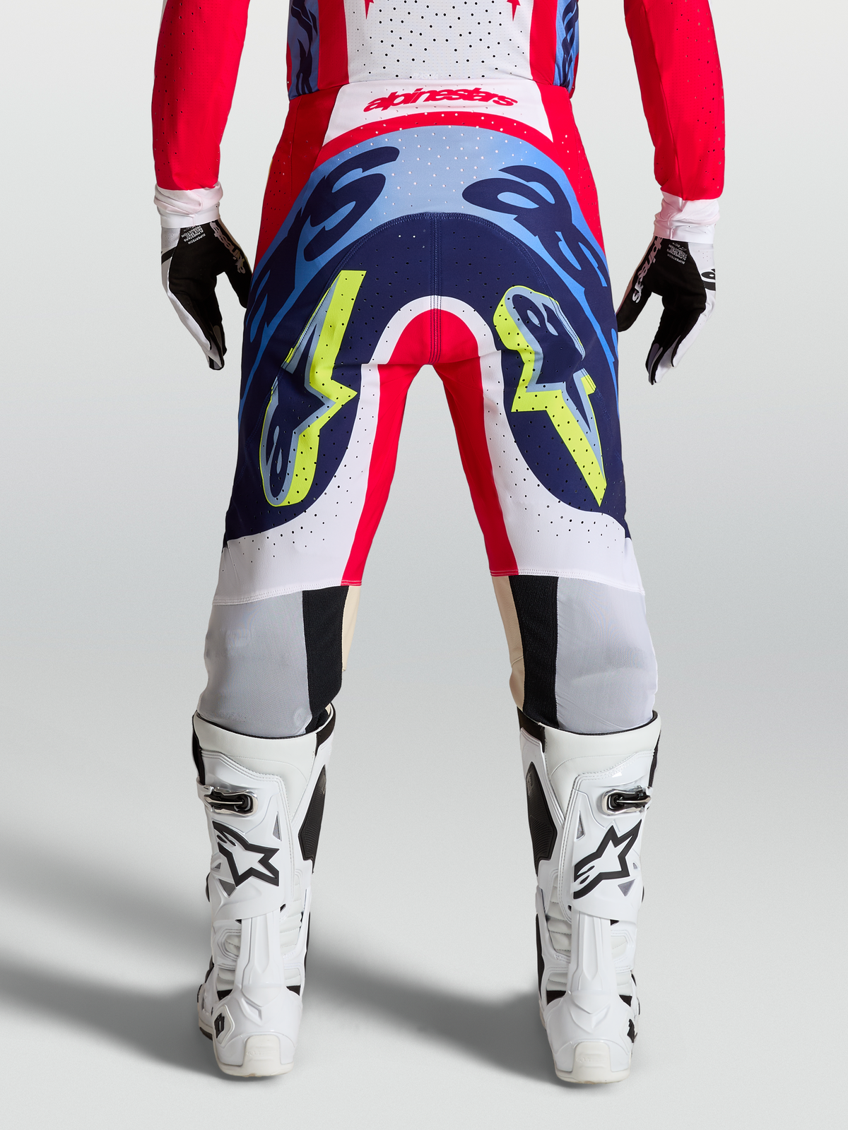 Alpinestars Supertech Dyna Broek, professionele motocrossbroek, rood en navy blauw, duurzame 4-way stretch constructie.