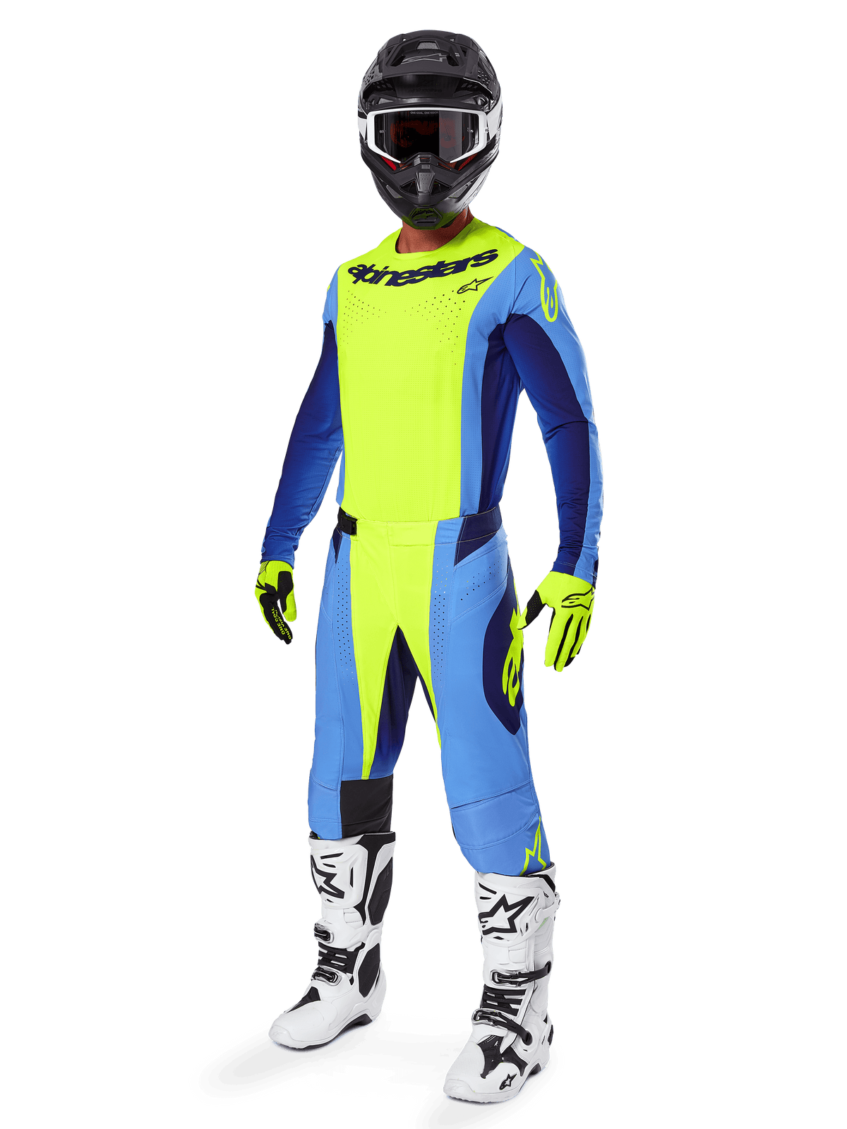 Alpinestars 2025 Techstar Melt crossbroek, motorcross broek, fluogeel en blauw, gedragen als onderdeel van een complete race-uitrusting met bijpassende jersey, geel-zwarte handschoenen, wit-zwarte laarzen en zwarte helm met witte bril, gecoördineerde off-road prestatiekleding.