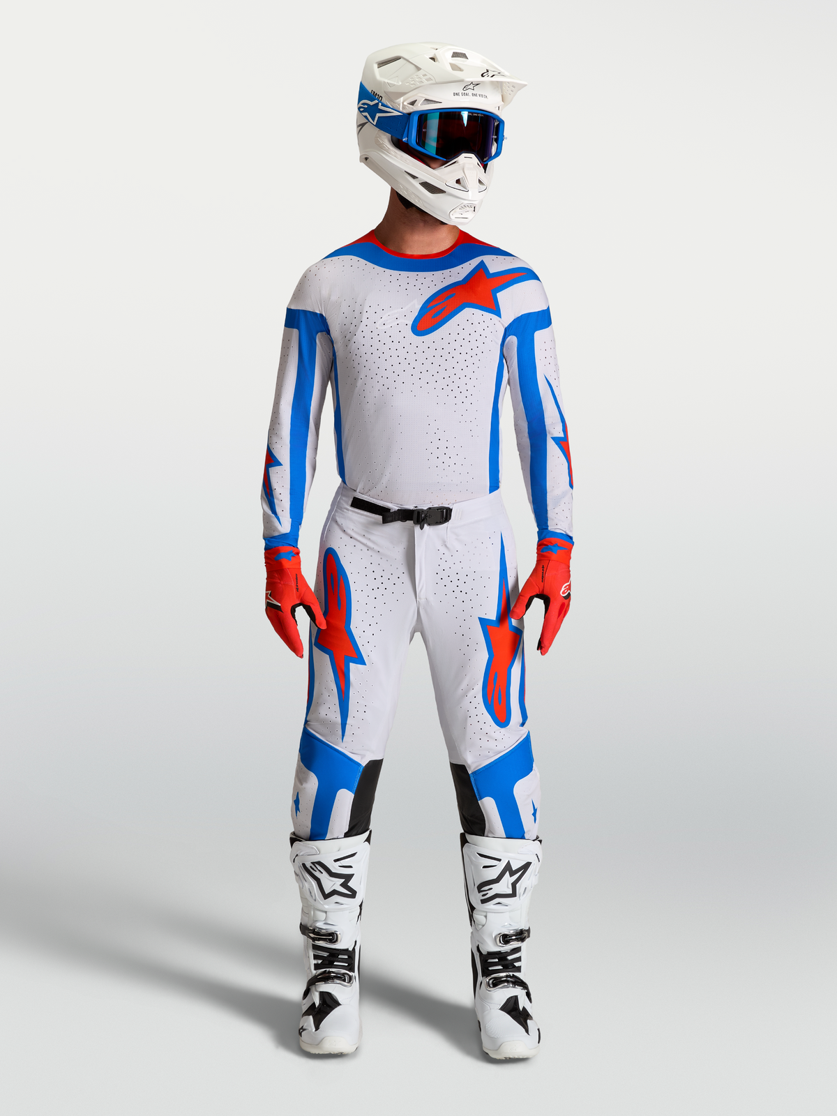 Alpinestars Supertech Vesta Motocross Gear Set in Light Lilac and Cardinal Red, featuring racing jersey, pants, and boots.