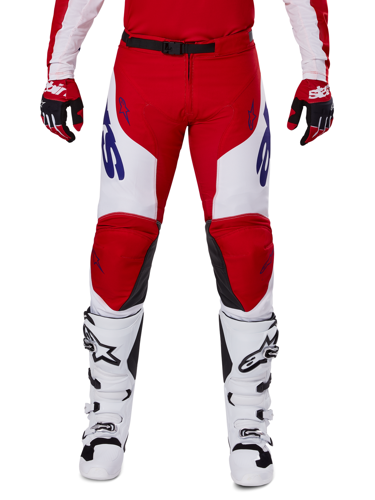 Alpinestars 2025 Racer Veil Pants, Motocross Pants, Bright Red and White, worn with matching red gloves and white boots, featuring blue branding on the thighs and a black waist belt, ergonomic sport cut for performance riding