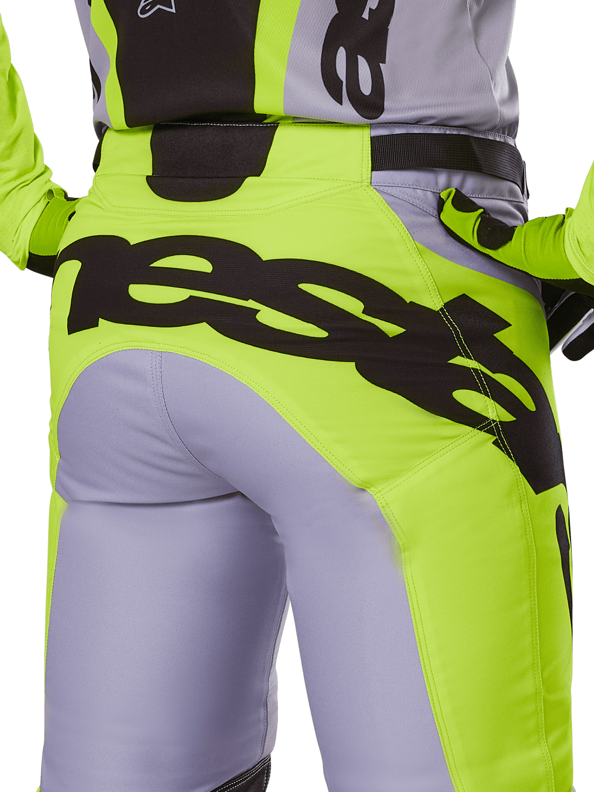 Alpinestars 2025 Racer Veil Pants, Motocross Pants, Gray and Yellow Fluo, rear view featuring large black branding across the seat, worn with matching jersey and gloves, technical off-road design