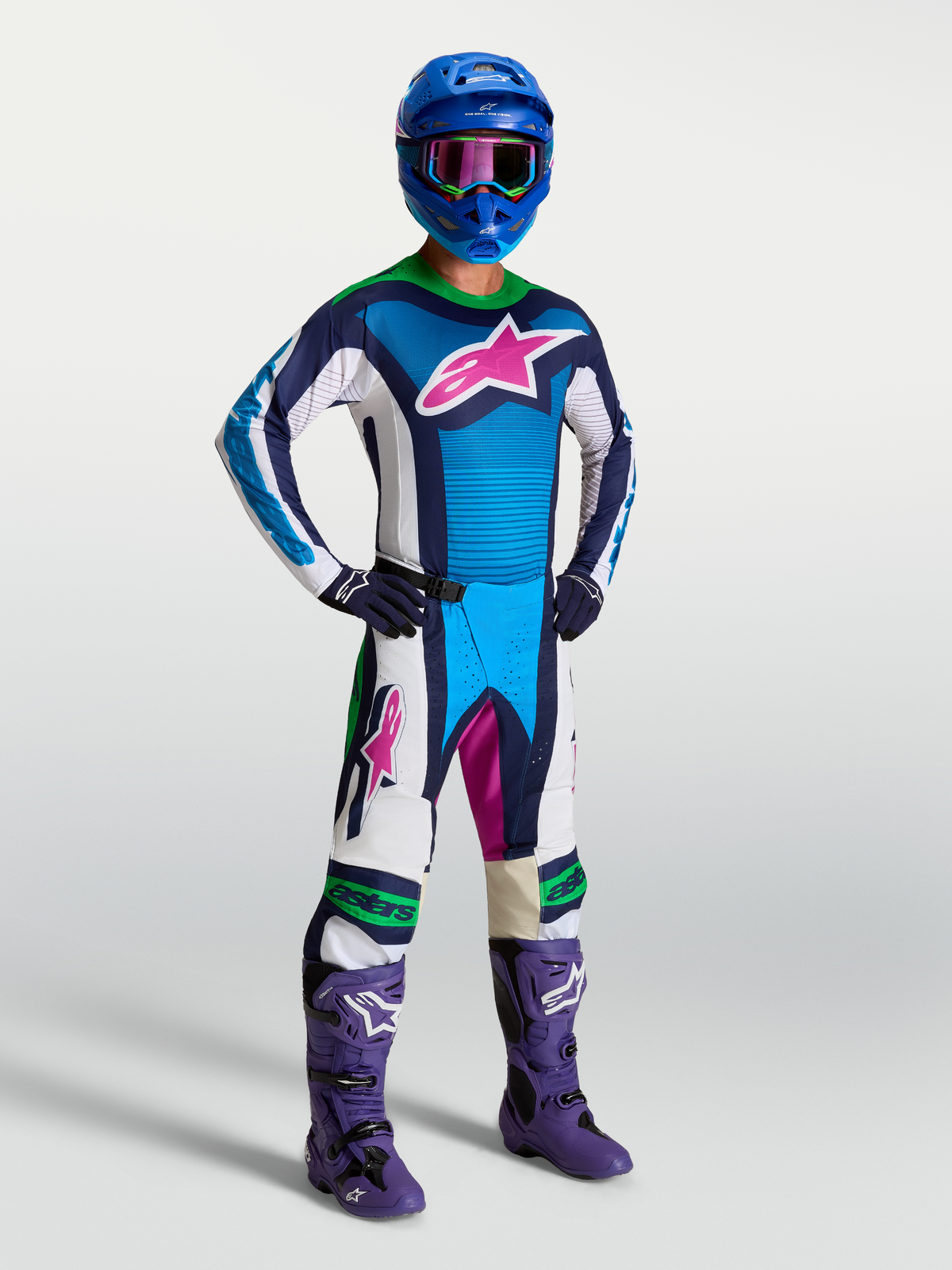 Alpinestars Pantalon Techstar Maven AND Techstar Maven Gear Set, tenue de motocross pour homme, bleu et blanc avec accents vert fluo, ensemble complet de protection tout-terrain haute performance.