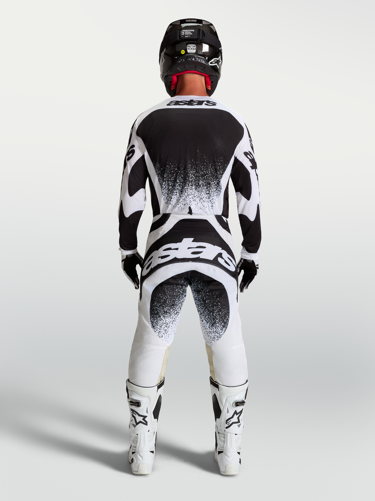 Alpinestars Techstar Swan Pants and Jersey, Men's Motocross Gear Set in Black and White with athletic race-fit and back branding.