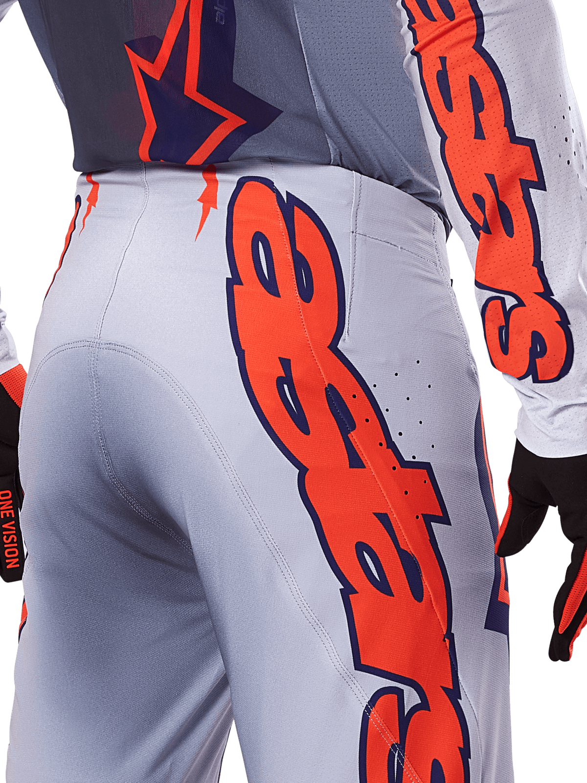 Alpinestars 2025 Supertech Lipan Hose und Trikot, Motocross-Ausrüstungsset, Grau und Orange Fluo, Nahaufnahme der Seite und Rückseite mit großem orangefarbenem Alpinestars-Branding, Performance-Ripstop-Gewebe mit perforierter Belüftung