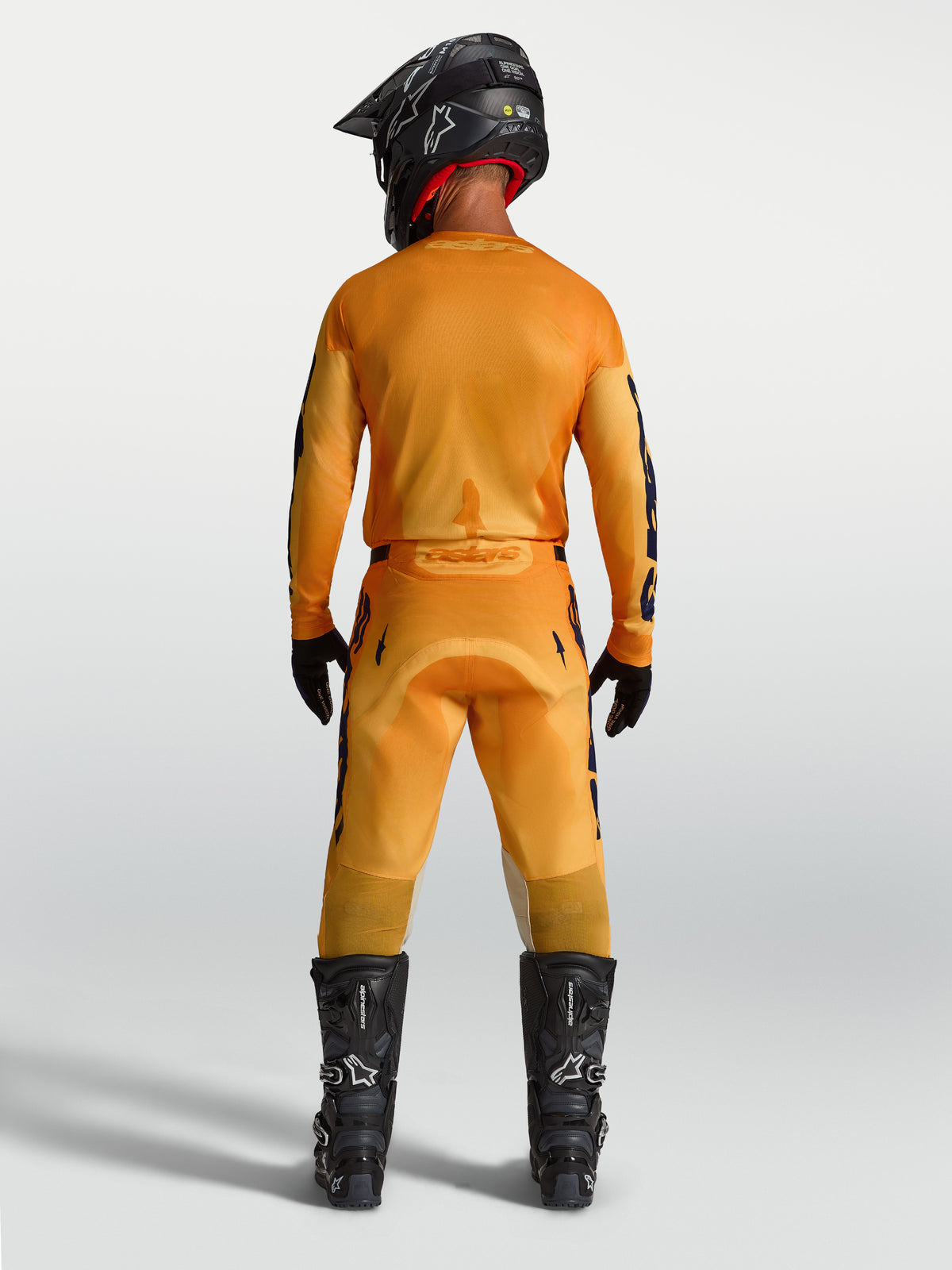 Alpinestars Racer Amber, pantalon de motocross pour homme, orange et bleu foncé, vue de dos, construction synthétique