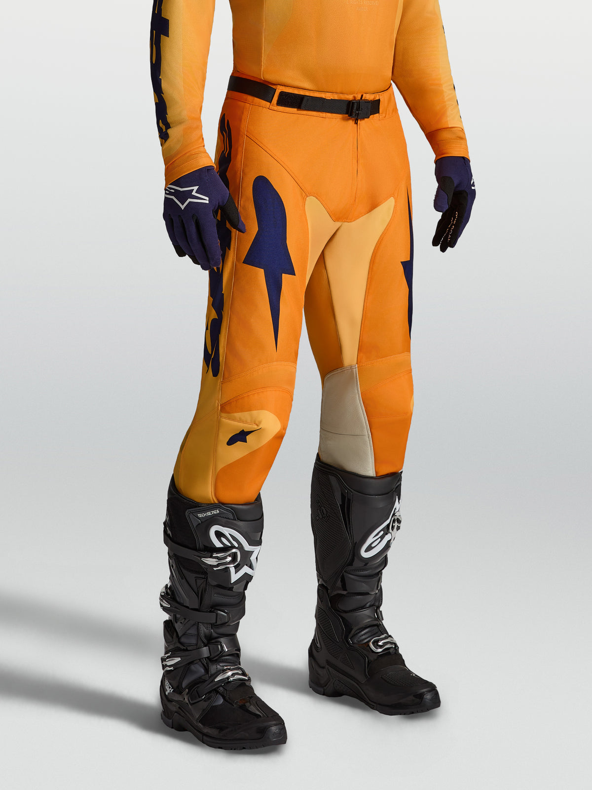 Alpinestars pantalon Racer Amber, pantalon de motocross orange et bleu foncé, inserts extensibles et jambes pré-courbées