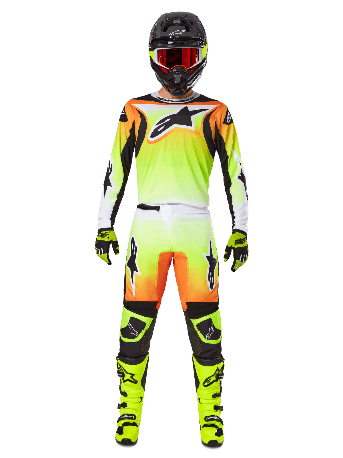 Alpinestars 2025 Fluid Wurx broek, motorcross broek, geel en zwart met oranje en wit kleurverloop, gedragen met bijpassende jersey, felgele laarzen en zwarte helm met rode bril, volledige motorcross race-uitrusting