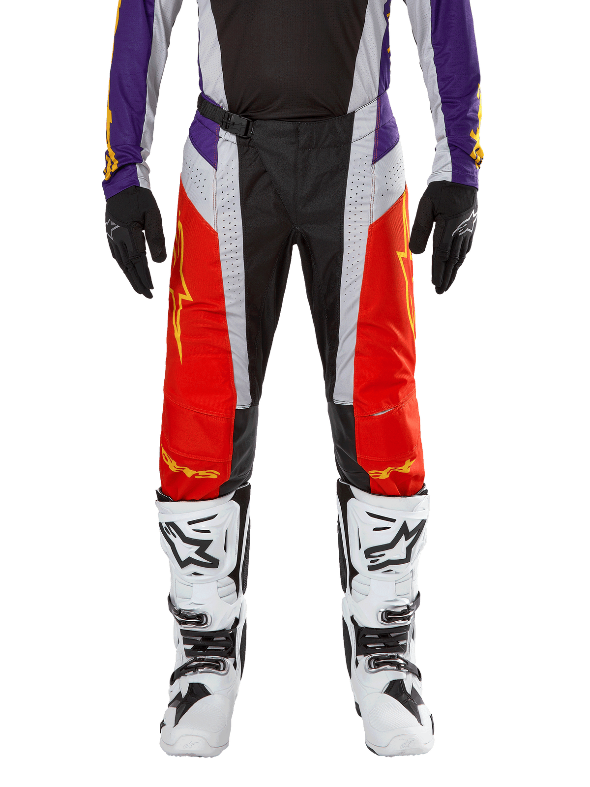 Alpinestars 2024 Techstar Ocuri Pants, Motocross Pants, Hot Orange Purple and Black, worn with matching jersey, black gloves, and white boots, featuring vibrant orange front panels, purple waist accents, and perforated grey sections, technical design for off-road racing