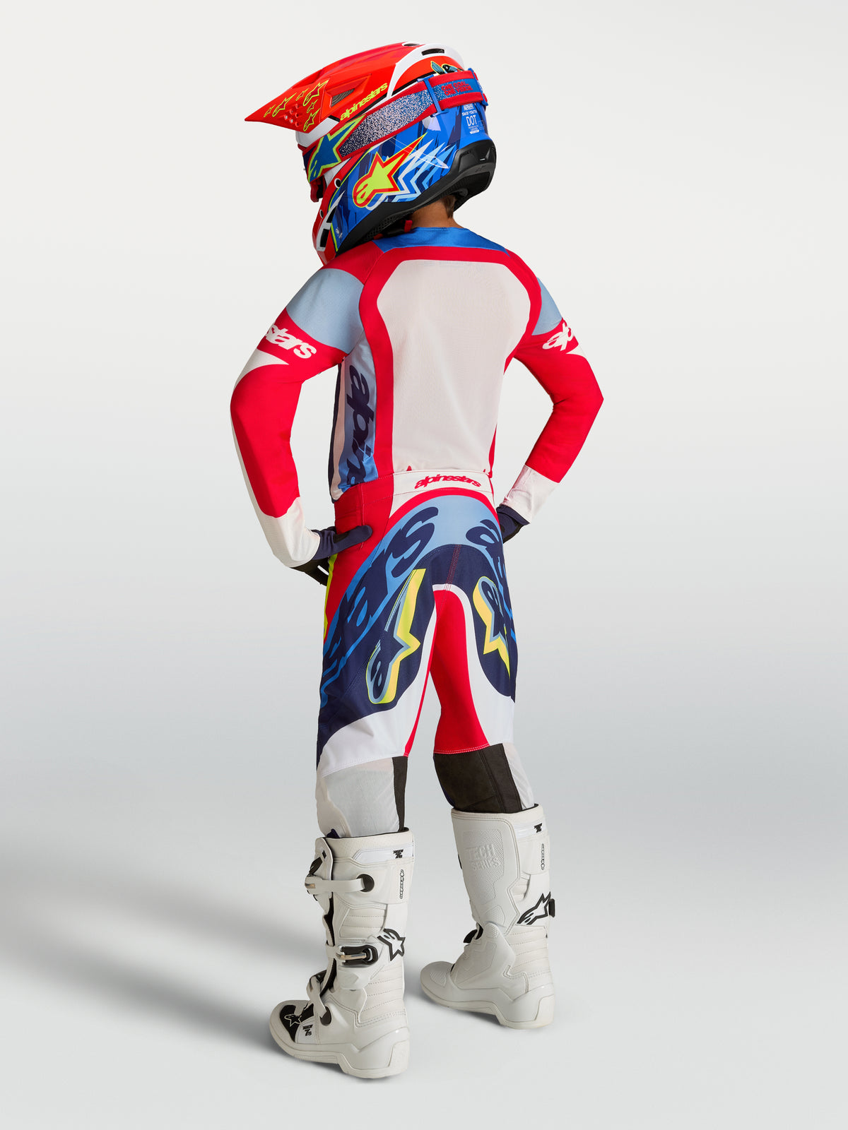 Pantalon Alpinestars Supertech Dyna Junior, équipement de motocross pour enfant, rouge et bleu marine, coupe athlétique haute performance vue de dos