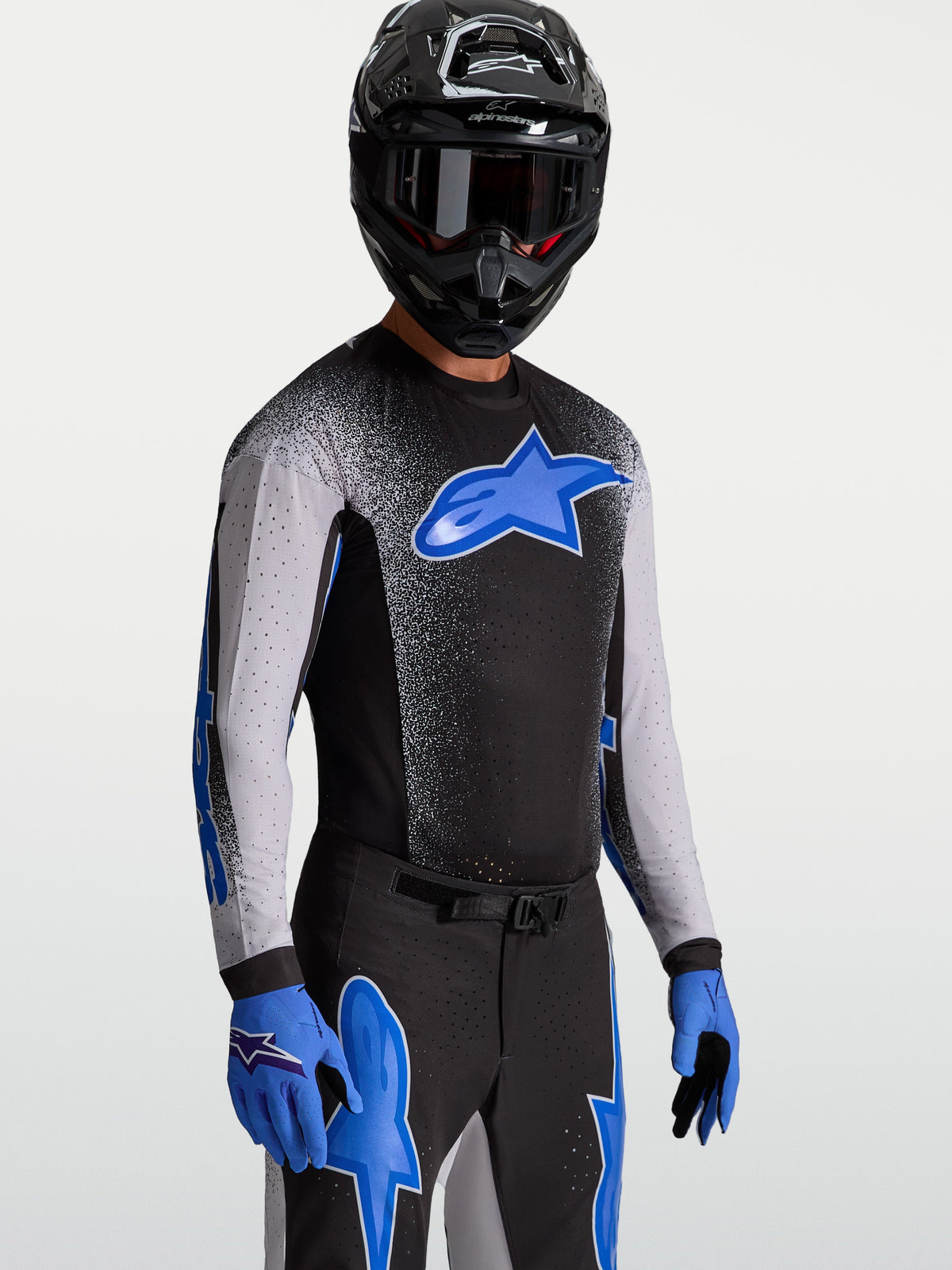 Maillot Alpinestars Supertech Hiten AFD, maillot de motocross pour homme, noir et bleu, avec maille extensible.