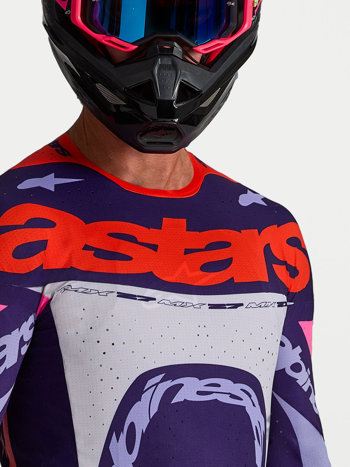 Alpinestars Maillot Supertech Dyna, maillot de motocross pour homme, violet et rose fluo avec mailles perforées et logos rouges.
