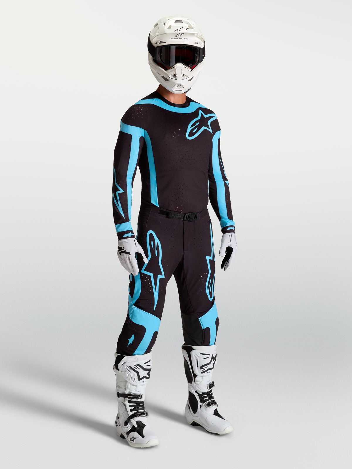 Maillot et ensemble Alpinestars Supertech Vesta, tenue de motocross pour homme, noire et turquoise, coupe athlétique.