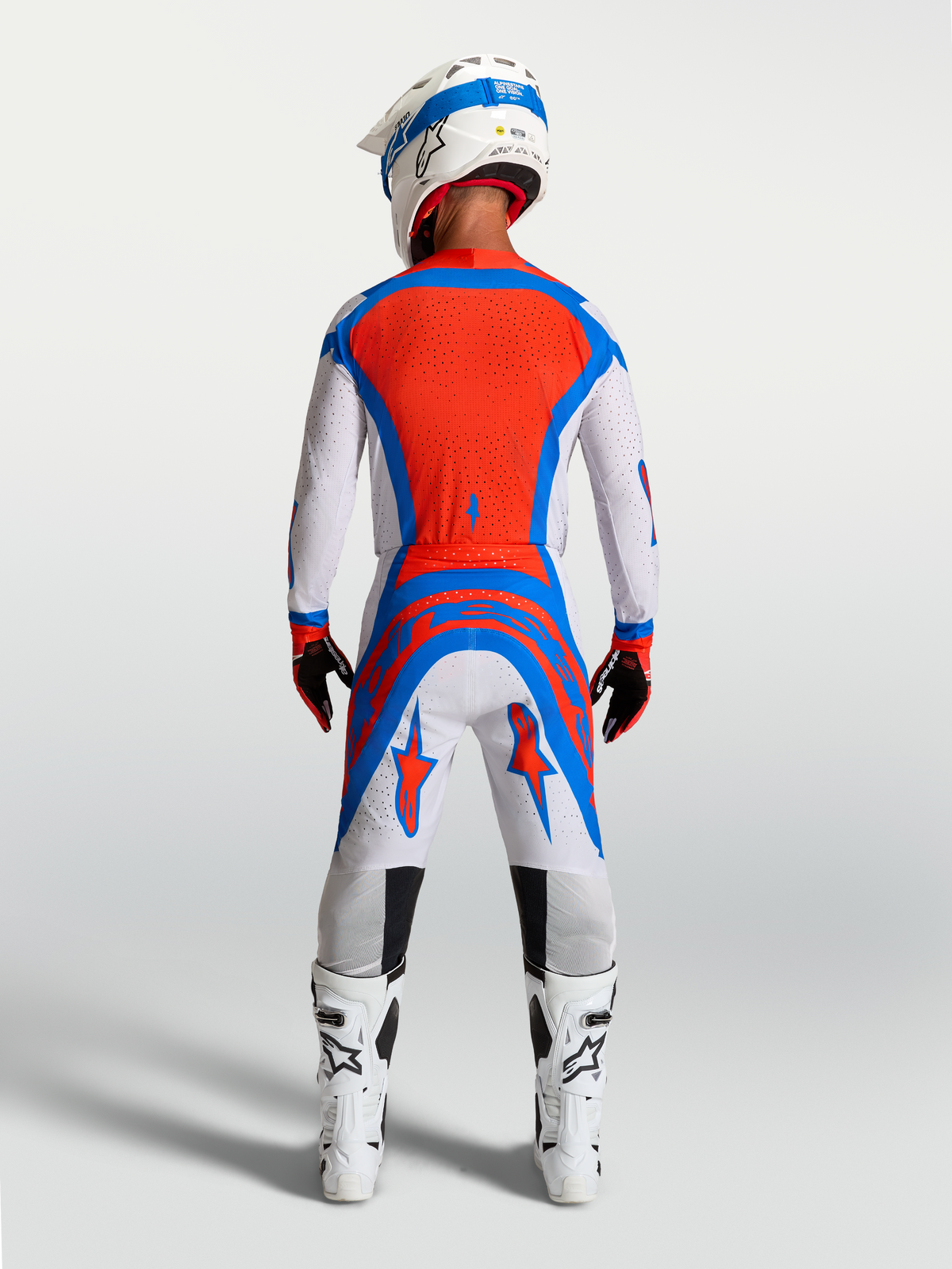Alpinestars Supertech Vesta, maillot et ensemble de motocross pour homme, rouge cardinal et bleu, vue arrière, coupe athlétique.