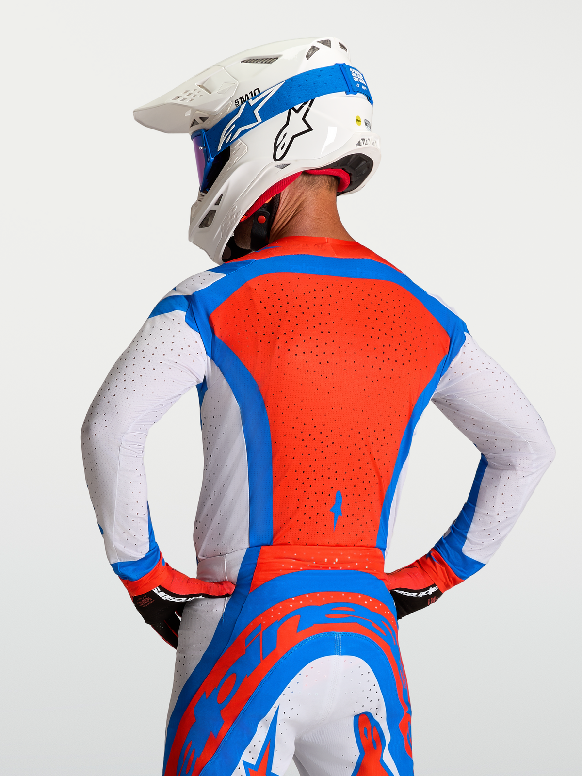 Alpinestars Supertech Vesta Jersey, Men's Motocross Jersey in Red and Blue with breathable laser-cut perforations.