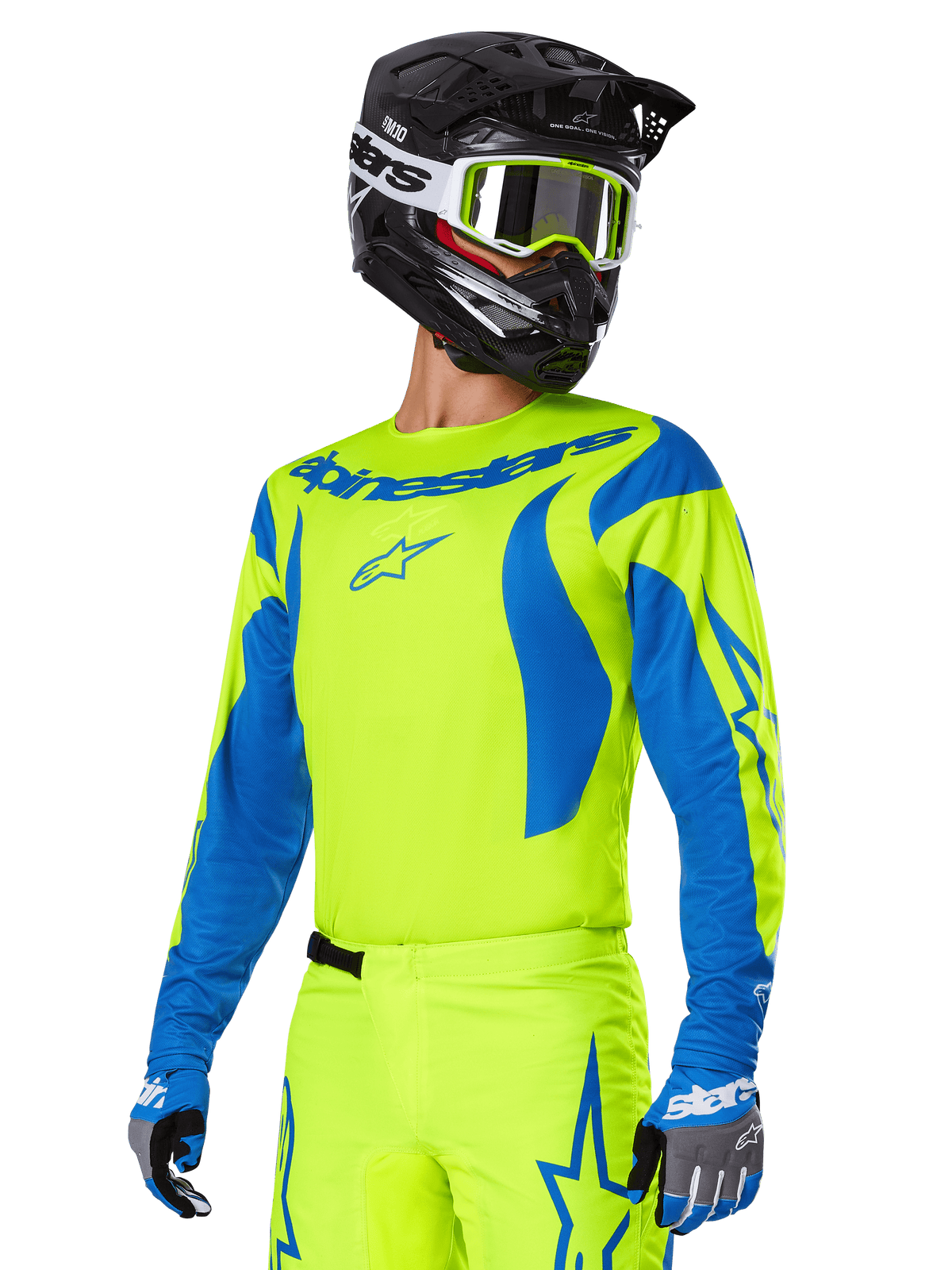 Alpinestars 2025 Fluid Haul Ausrüstungsset, Motocross-Trikot und -Hose, leuchtendes Gelb und Blau, getragen mit schwarzem Helm und gelber Crossbrille, wellenartige blaue Muster an den Ärmeln und blaue Stern-Logos auf der Hose, abgestimmtes Offroad-Rennoutfit