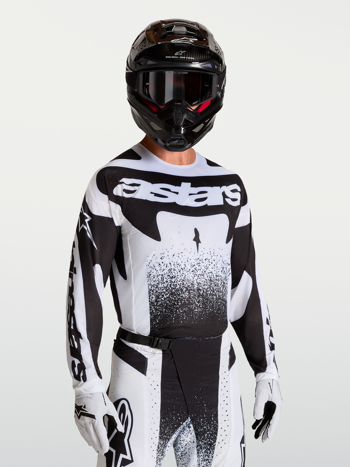 Maillot Techstar Swan Alpinestars, maillot de motocross noir et blanc pour homme, coupe athlétique et aérations laser.