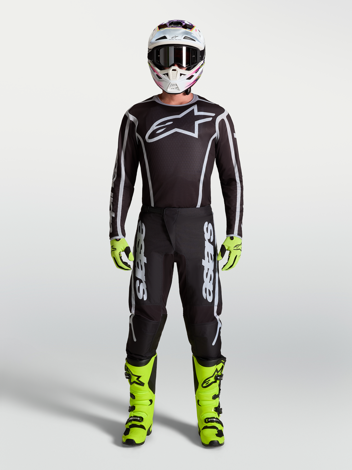 Alpinestars Fluid Apex V2 Jersey AND Fluid Apex V2 Gear Set, Men's Motocross Gear in Black, Silver, and Fluorescent Yellow.